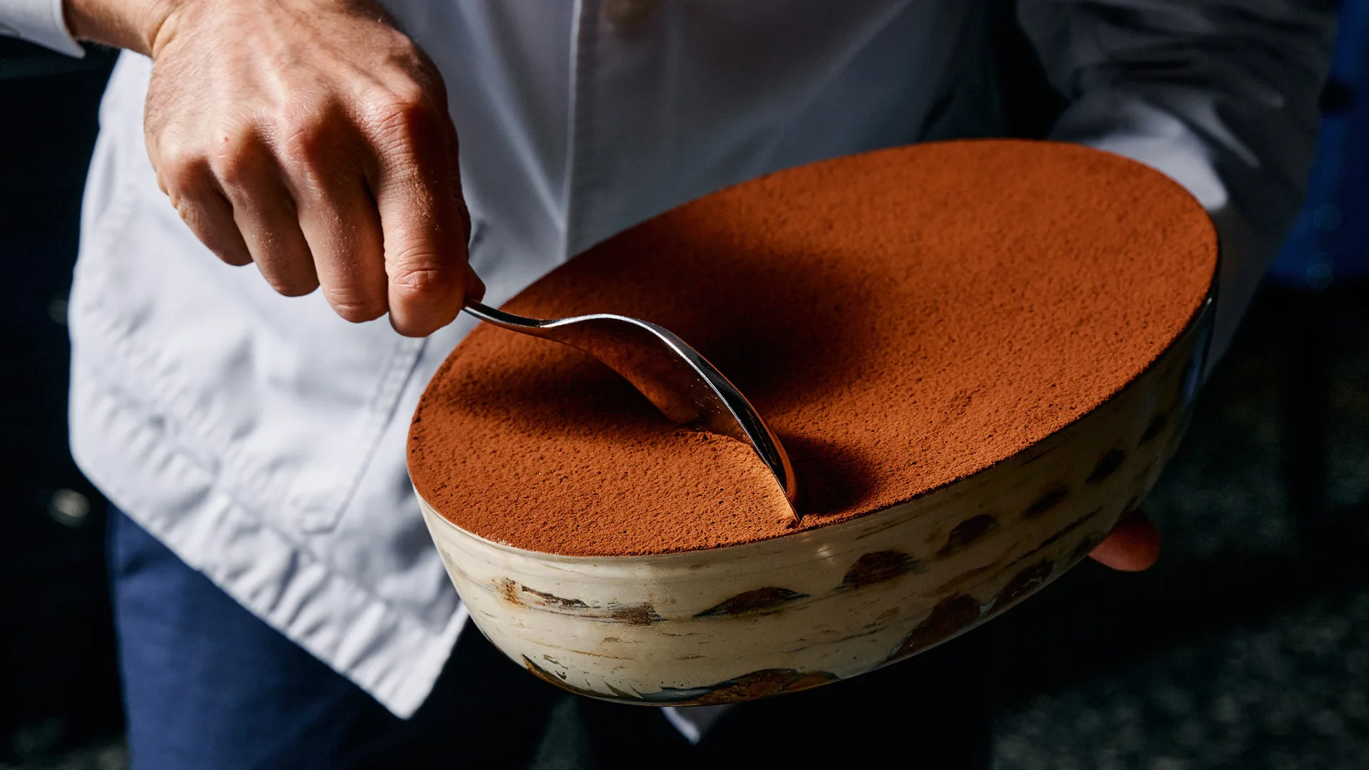 A fresh vessel of the signature tiramisu ready to be scooped at Grill Americano Sydney