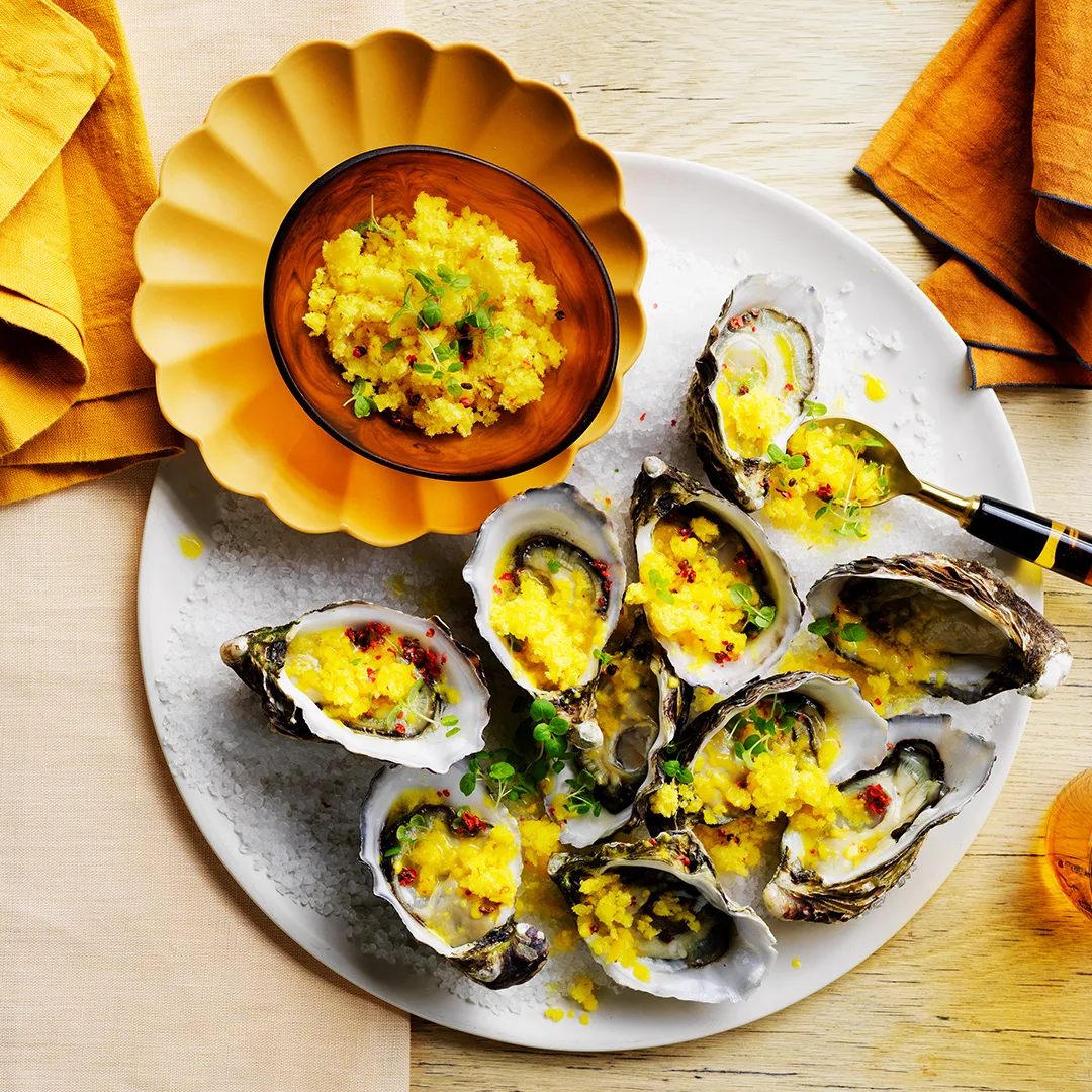 Pickled pineapple and pink peppercorn granita oysters
