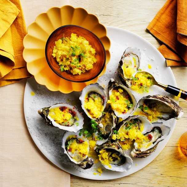 Pickled pineapple and pink peppercorn granita oysters