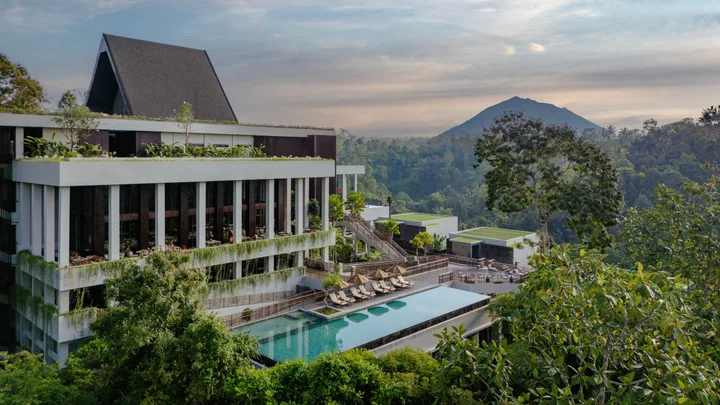 Exterior view of Anantara in Ubud Bali with mountain in background