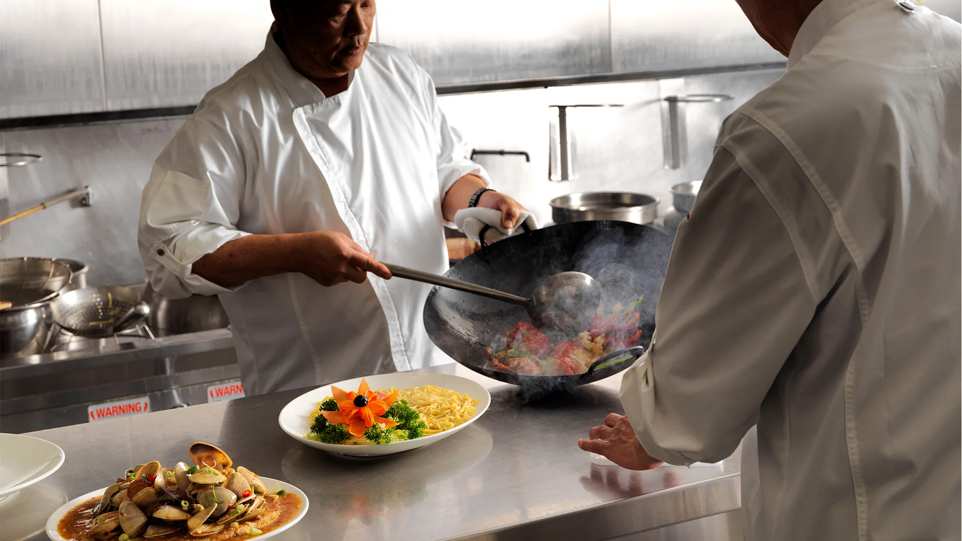 Plating up in the kitchen at Golden Century, now at Barangaroo's Crown Sydney