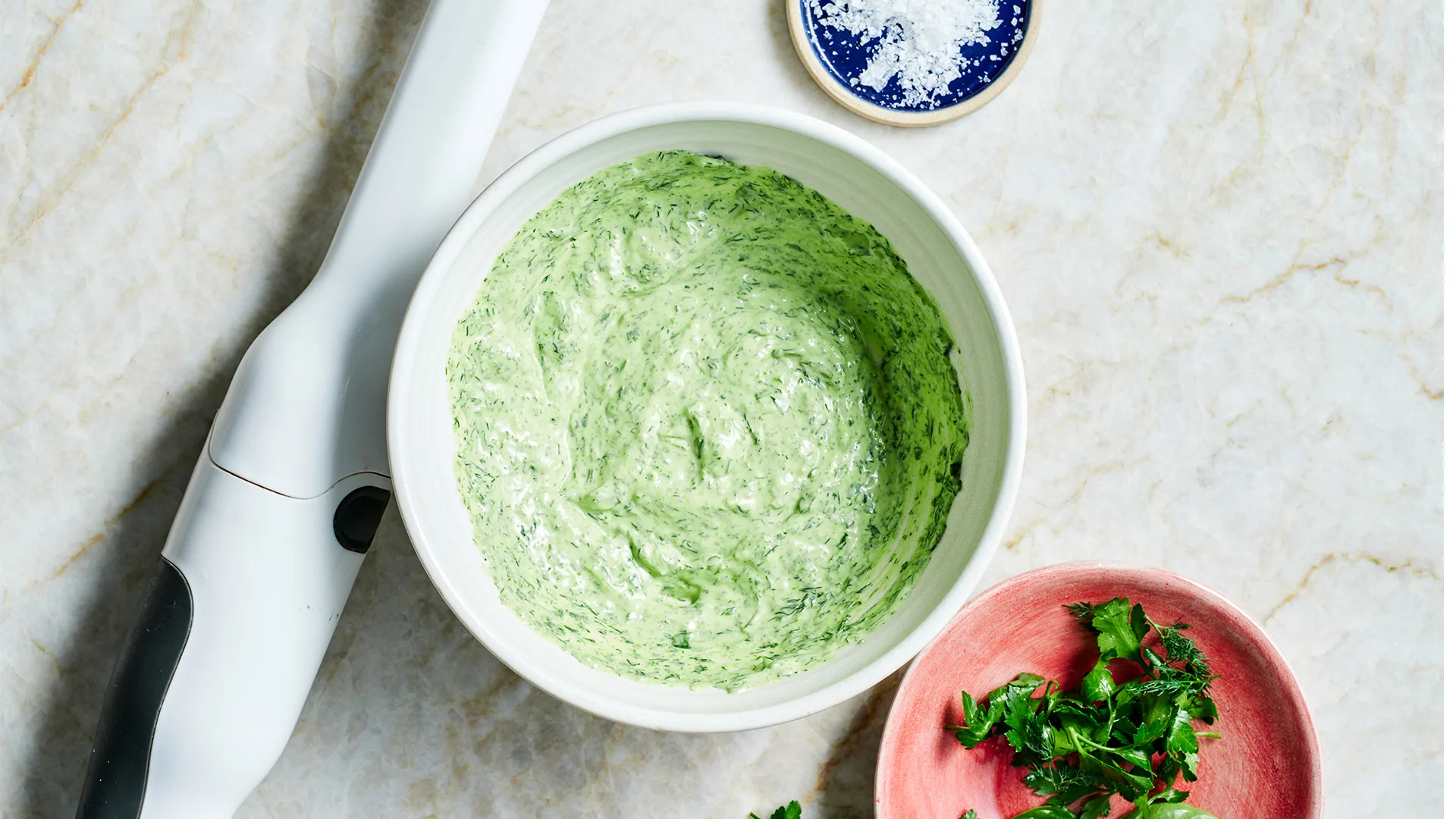Combining the ingredients for the herb mayonnaise