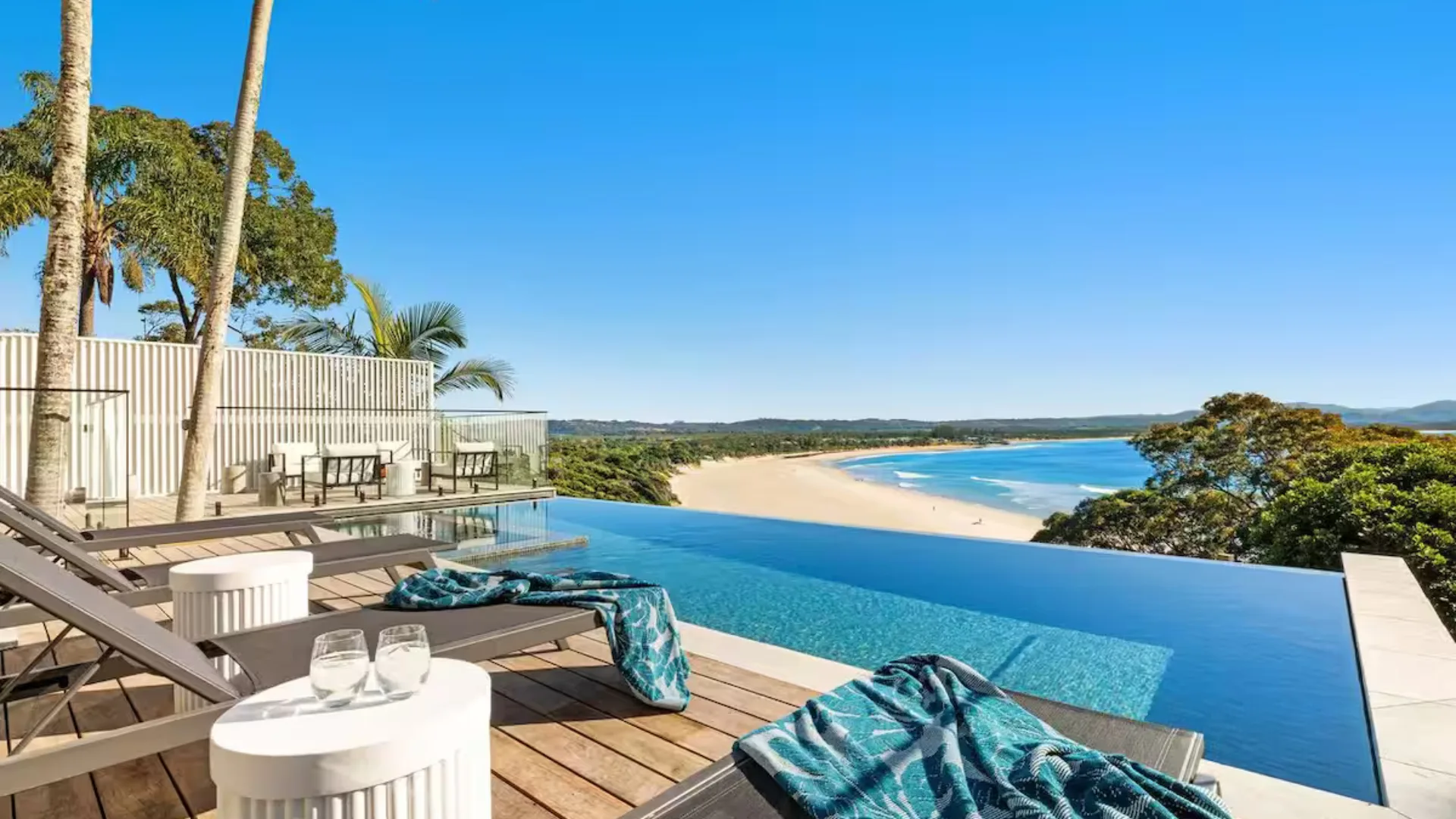 Sway is a luxe Airbnb with views of Byron Bay's beautiful beaches, an infinity pool and bikes and surfboards for guest use.