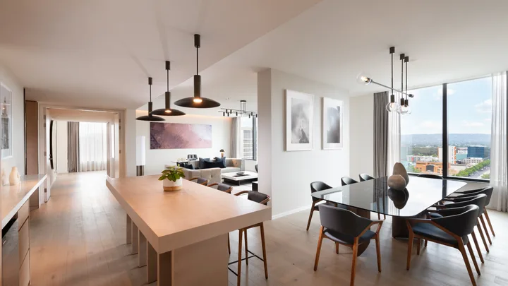 The light-filled dining and living area at the Postmaster Suite, Adelaide Marriott