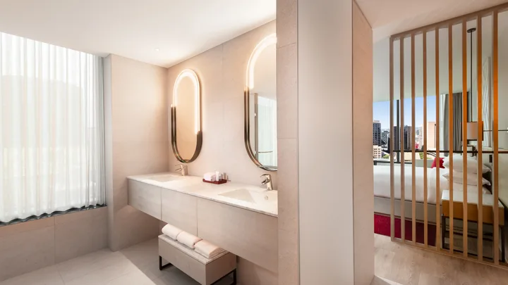 The Premium King bathroom suite with double sinks and mirrors at the Adelaide Marriott.