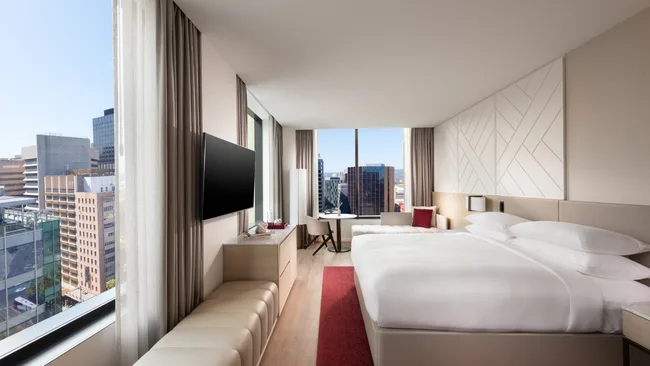 The light-filled Premium King Room suite overlooks the city at the Adelaide Marriott