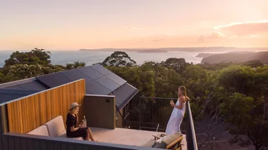 Sunset on the deck overlooking the sea at the Lodge at Bells at Killcare.