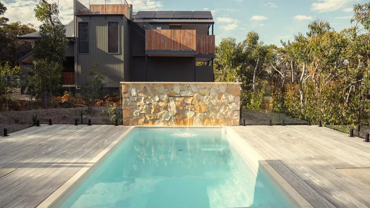 The Lodge exterior with swimming pool at Bells at Killcare.