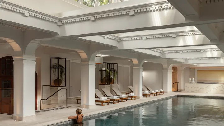 The elegant marble Roman bath-style indoor pool at Capella Sydney, NSW.