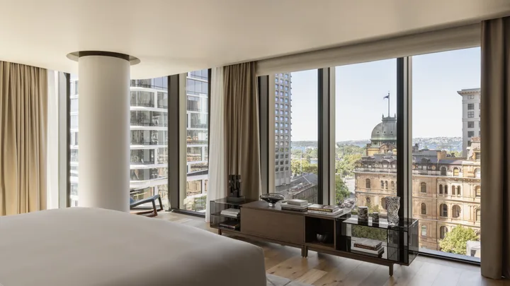 Sweeping views across the city from the interior bedroom of the Capella Suite, Capella Sydney.