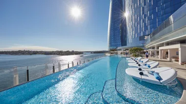 The glistening blue infinity pool at the Crown Towers Sydney
