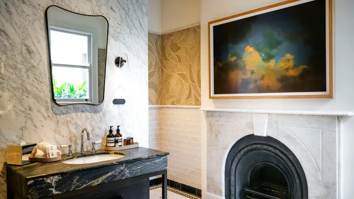 The sleek bathroom suite at the Grand National Hotel, Paddington.