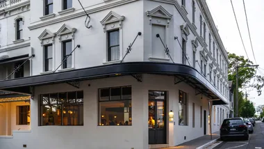 The historic exterior of The Grand National Hotel in Paddington.