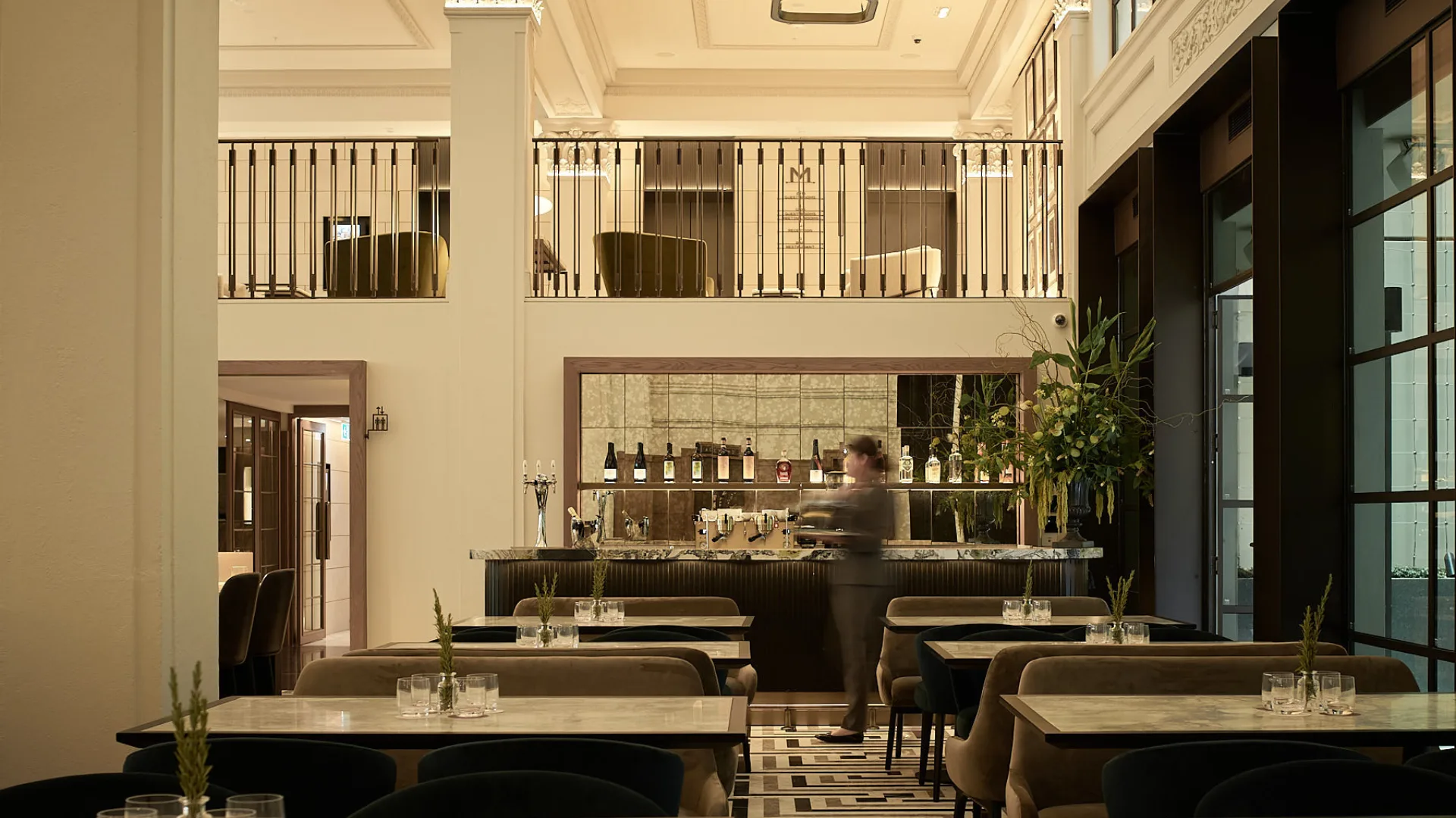 The stylish interior of Luci Restaurant at Hilton Little Queen Street, Melbourne.