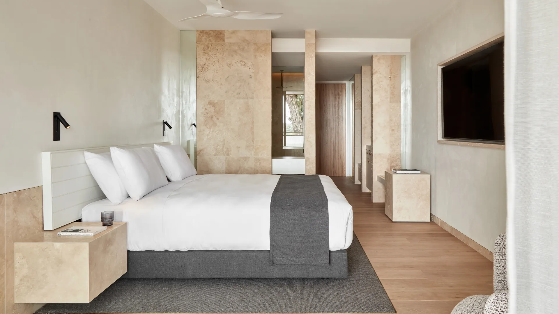The elegant, modern, neutral-toned bedroom suites at Hotel Sorrento, Mornington Peninsula