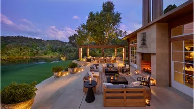 The terrace at dusk at the newly reopened Huka Lodge New Zealand