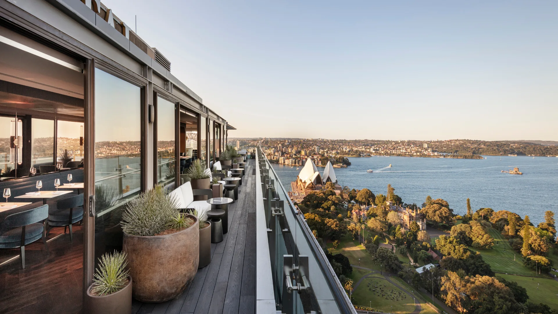 Sweeping views of the Opera House and Harbour from Aster Bar's balcony at Intercontinental Sydney