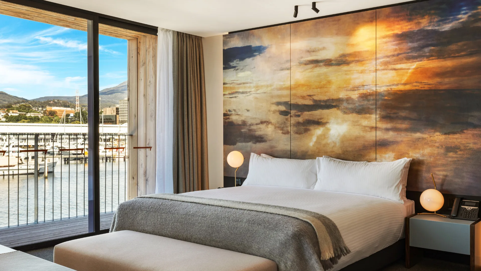 The warm rustic tones of the Superior Waterfront Room at MACq01 Hotel, Hobart