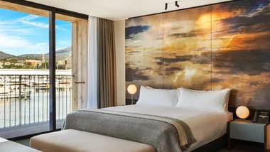 The warm rustic tones of the Superior Waterfront Room at MACq01 Hotel, Hobart