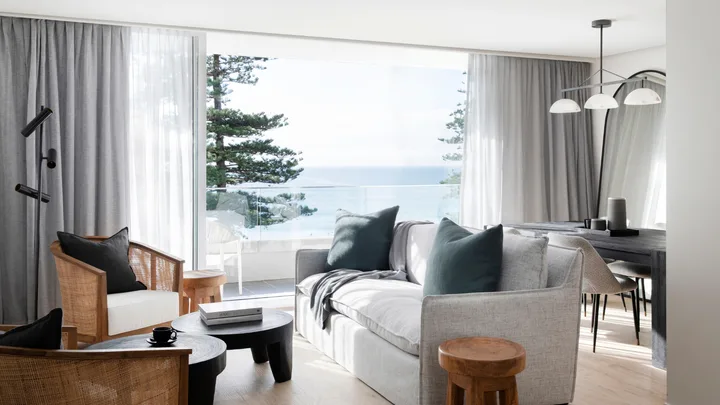 The cool white and blue living room interior at Manly Pacific