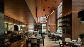 The dark wood interiors of Marmelo restaurant, Hyde Melbourne Place