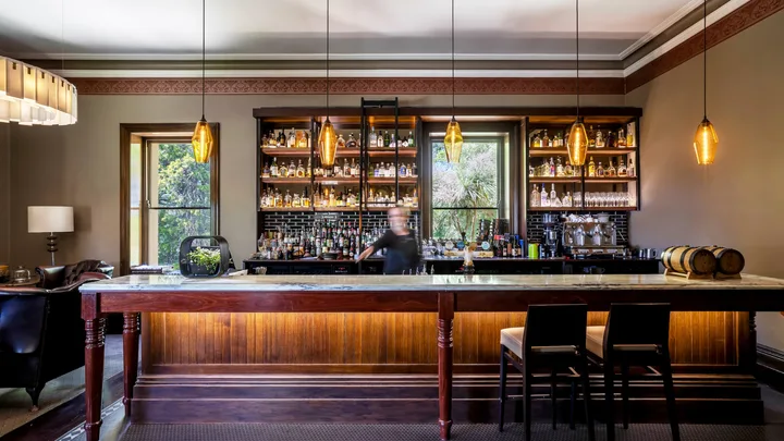 The elegant wood interior of the Arthur Waterhouse Lounge at Mount Lofty House