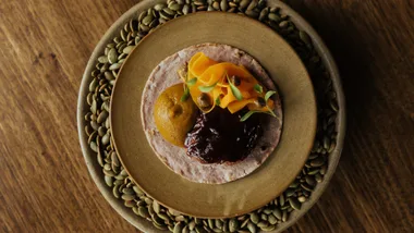 Slow cooked short rib al pastor, aji amarillo, pineapple with tortilla.