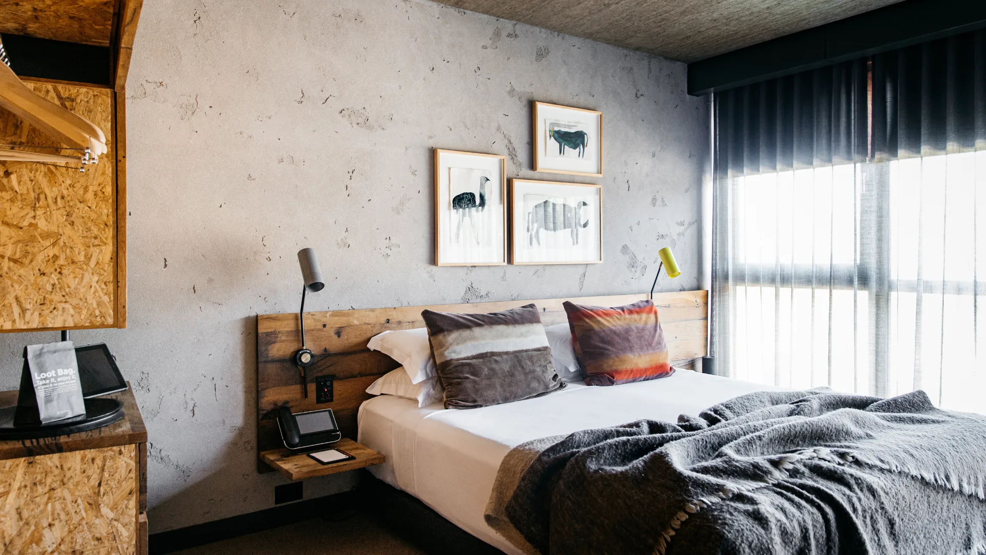 The rustic interior of the Sun Room suite at Ovolo Nishi, Canberra.