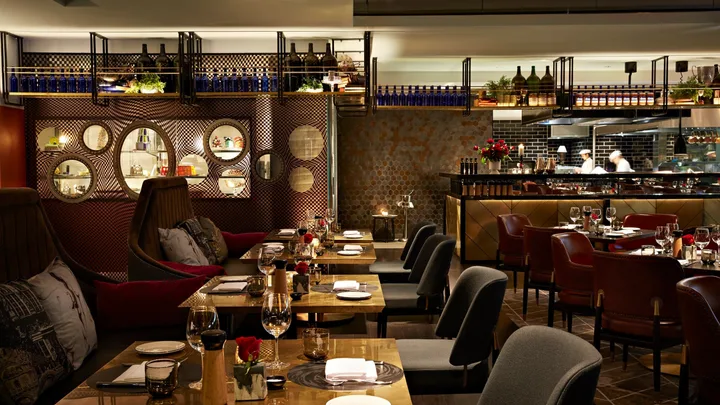 The dark, glamorous interior of Pascale Bar & Grill at QT Melbourne