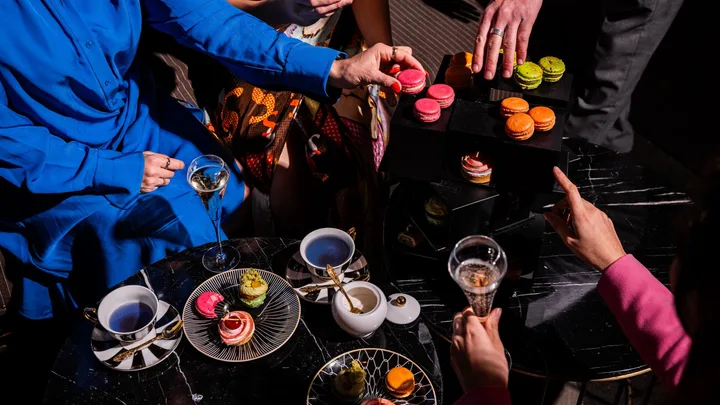 High Tea by Adriano Zumbo at QT Sydney features macarons and champagne.