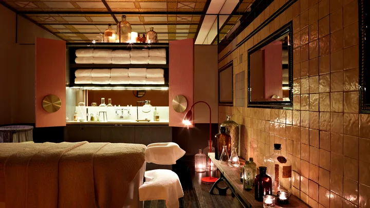 The cosy and moody subterranean QSpa at QT Sydney