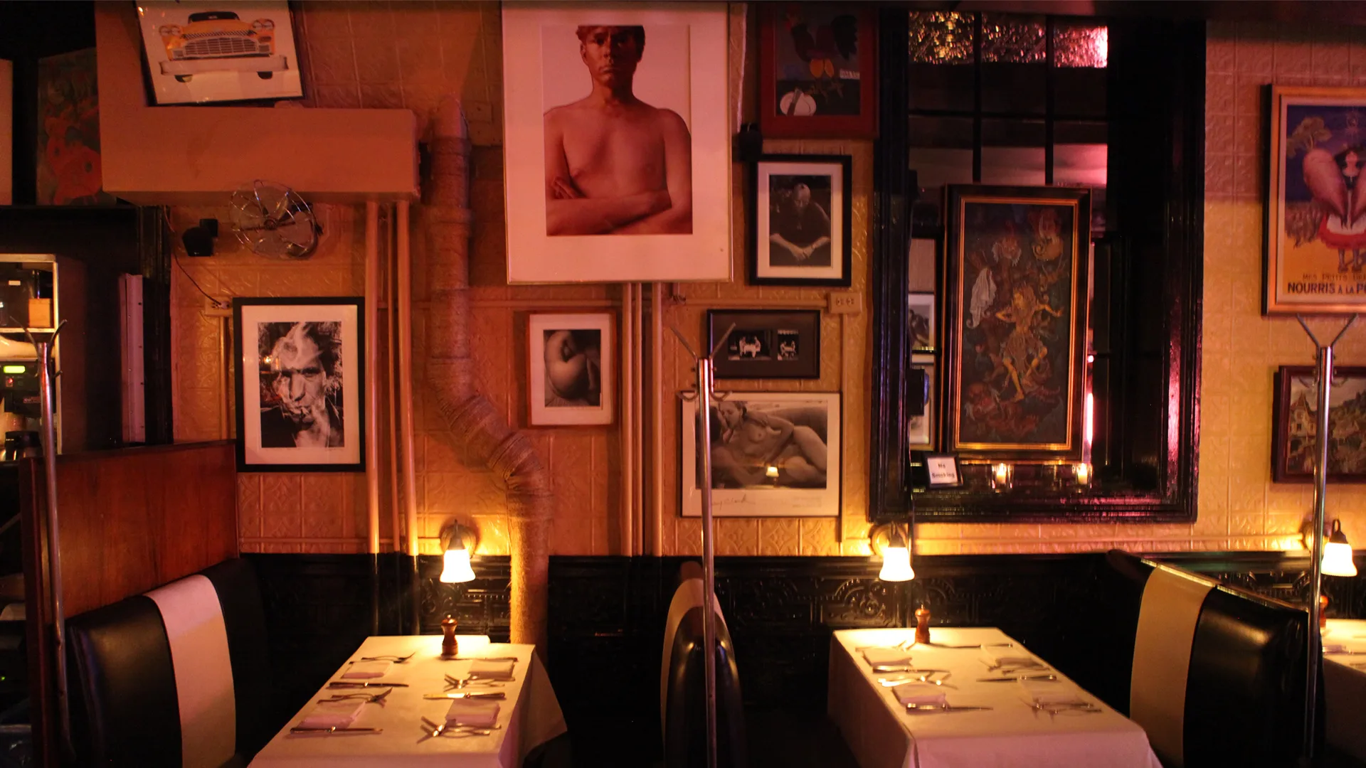 The moody dining room at Raoul's, one of the best New York restaurants for late-night dining