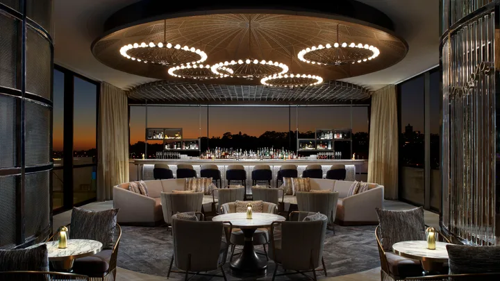 The darkly lit plush interior of the Songbird Bar, Ritz-Carlton Perth