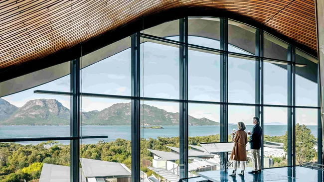 Panoramic mountain views from the floor-to-ceiling windows of the lobby at Saffire Freycinet