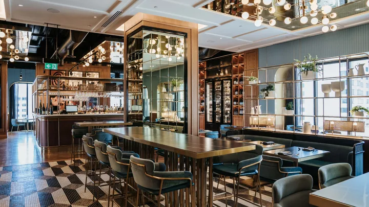 The elegant bistro-style decor at Garcon Bleu restaurant at Sofitel Adelaide