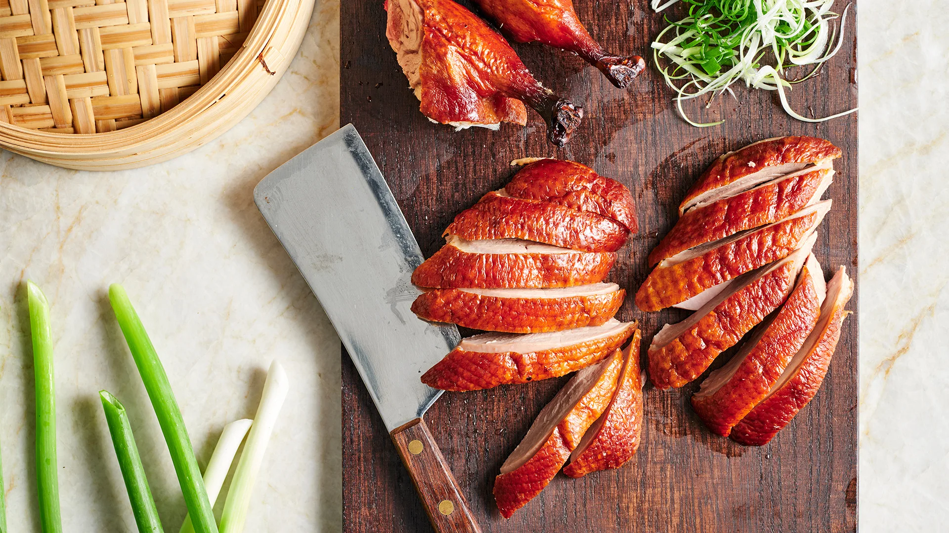 Cutting up the roasted Peking duck.