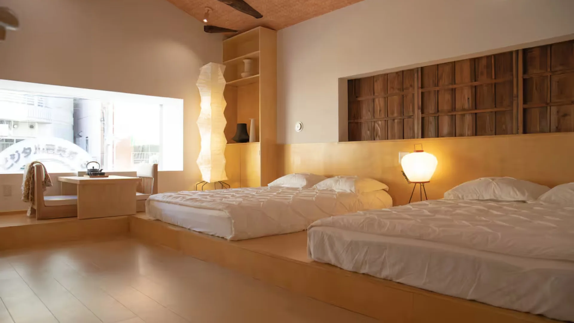 Warm tones and light-filled spaces at Tsutenkaku Villa in Osaka