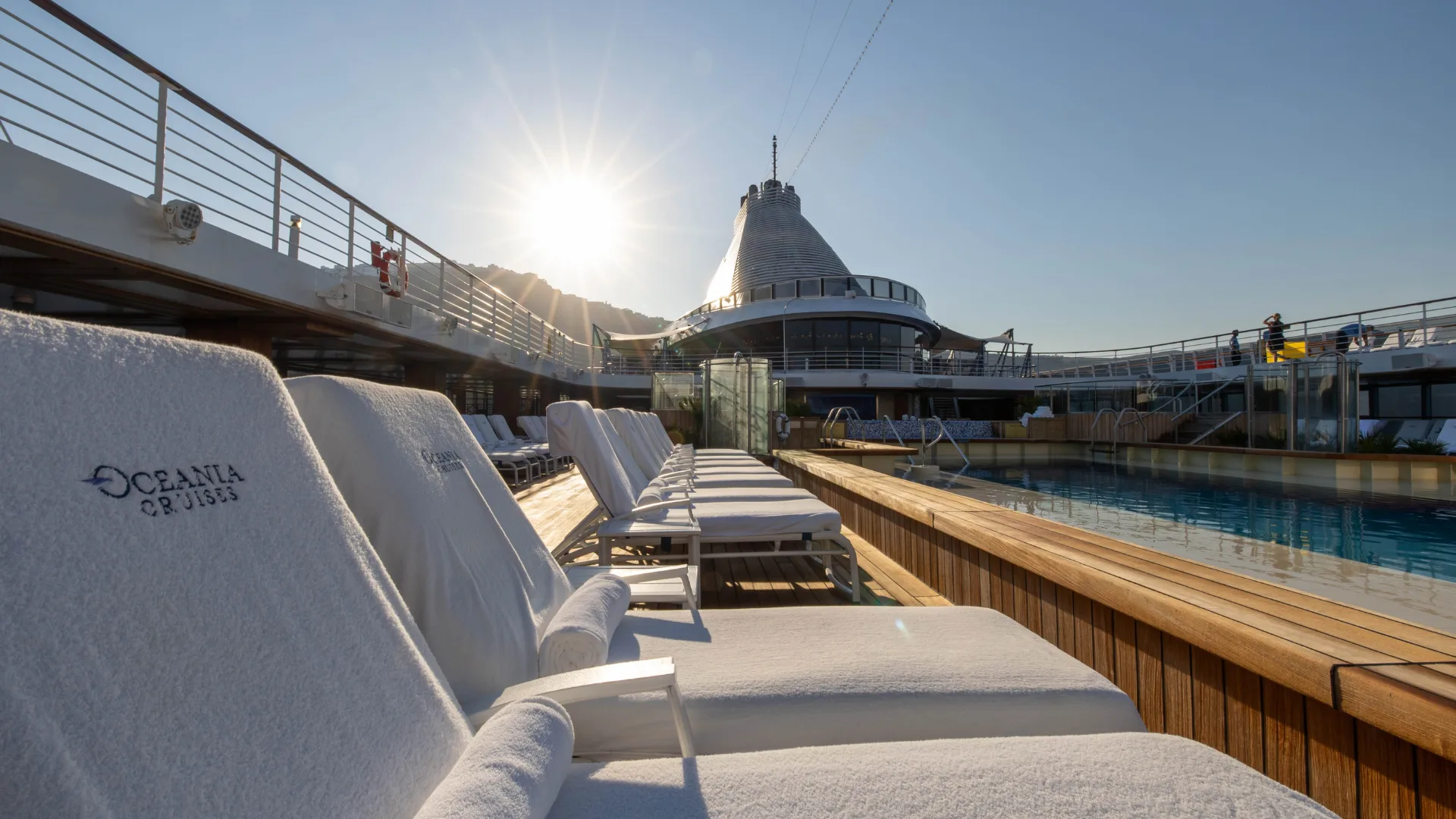 soak up some sun by the pool on this luxury cruise ship