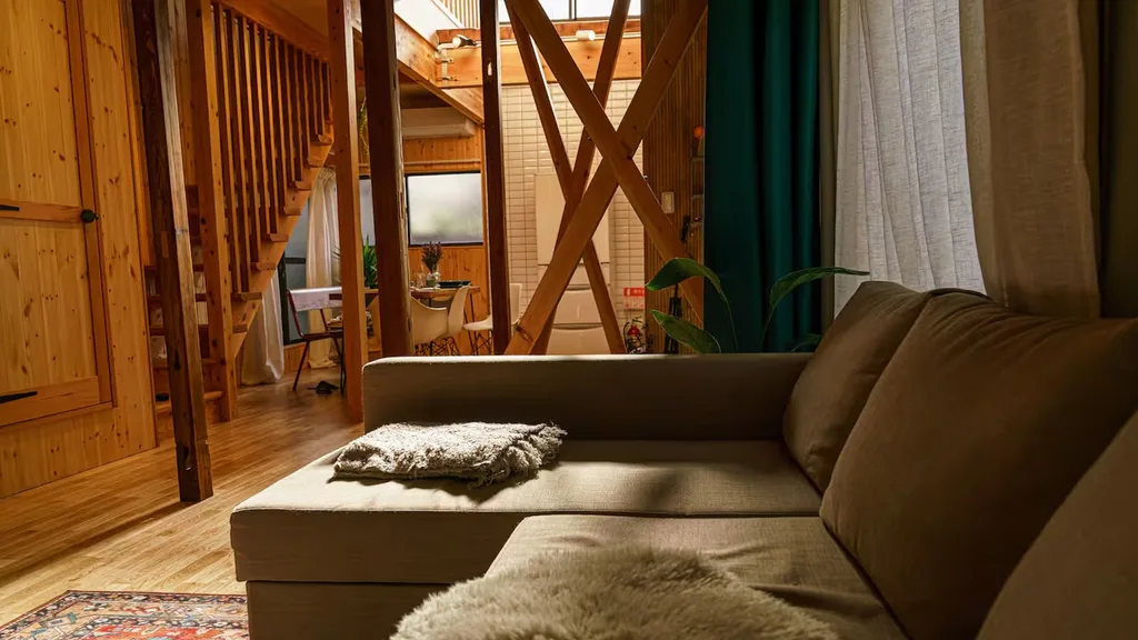 This Airbnb in Tokyo's trendy Sangenjaya neighbourhood has indoor and outdoor baths and a Japandi aesthetic