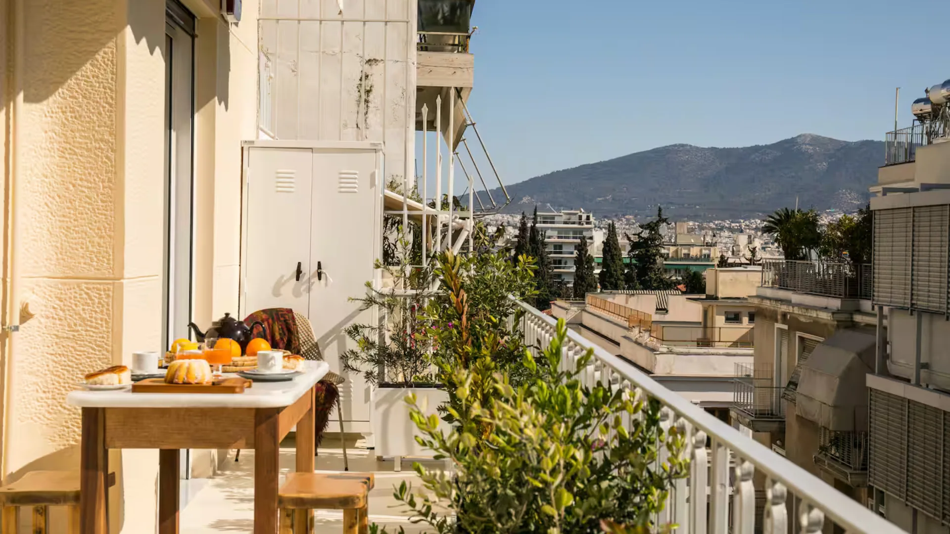 outdoor shot of an airbnb apartment stay in kolonaki athens greece with views of the acropolis