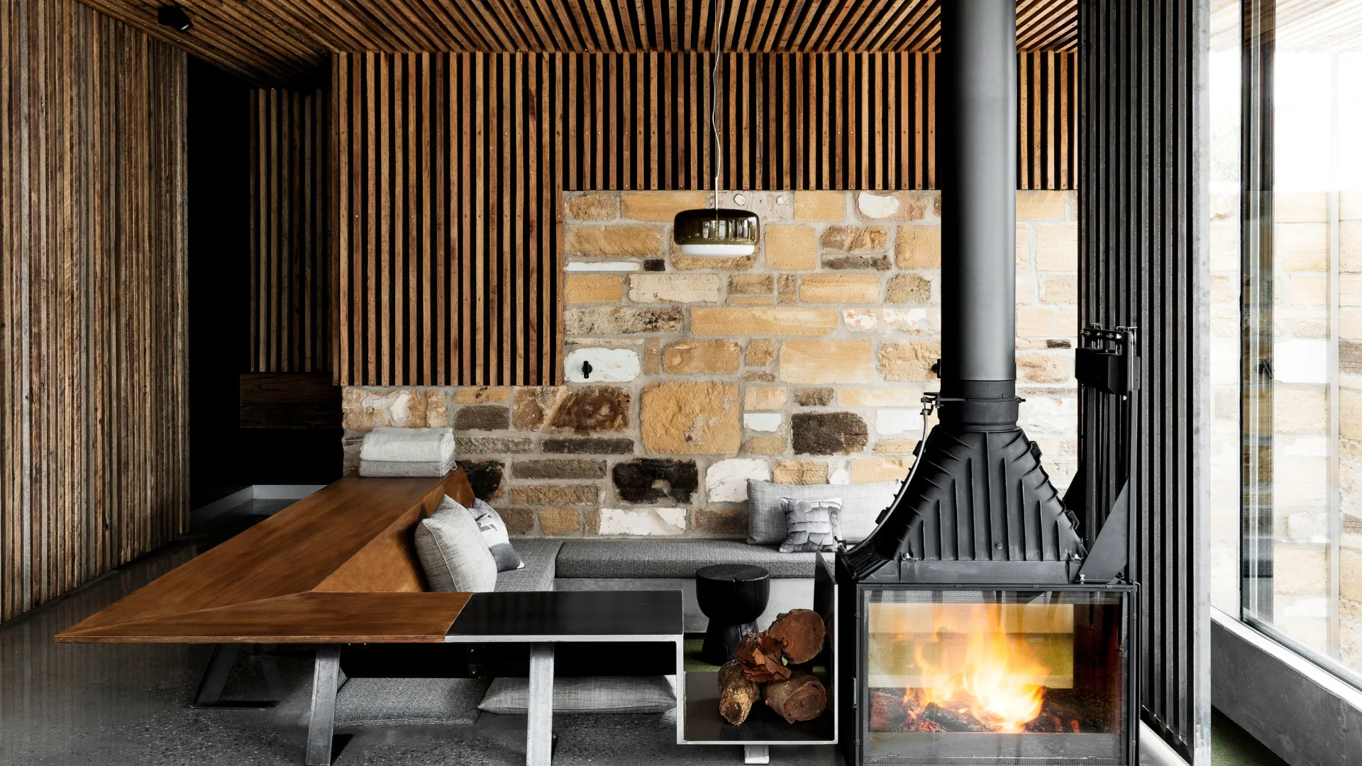 The Salon restaurant's cosy fire pit at Drift House, Port Fairy