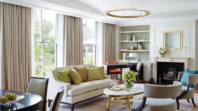 The opulent white-and-gold decor of the Observatory Suite at the Langham Sydney.
