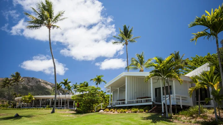 Lizard Island beachfront suite with palm trees