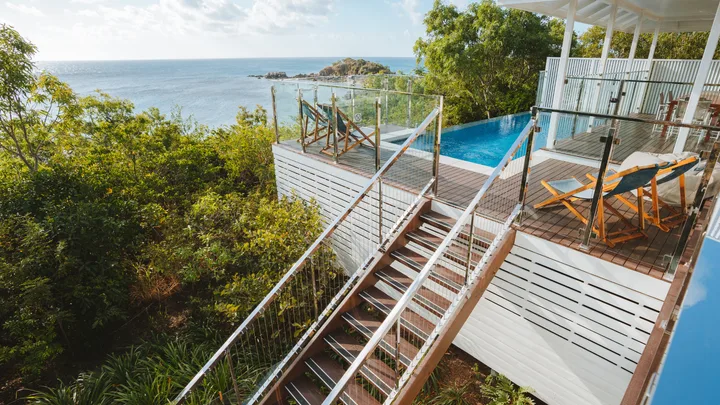 The private pool at The Villa with steps down to the beach at Lizard Island, Queensland.