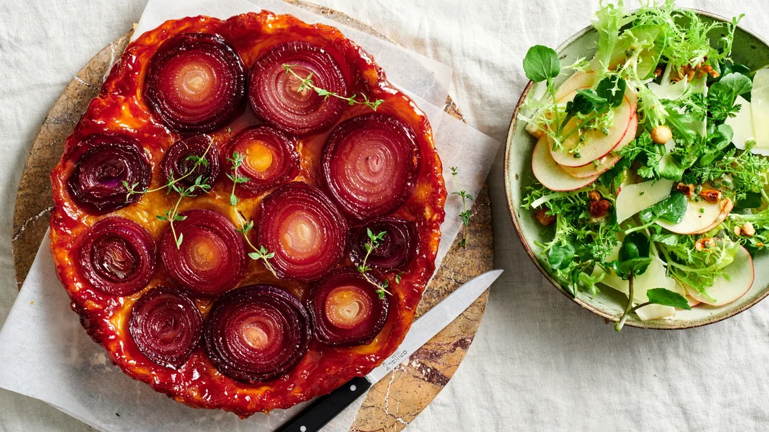 Roast onion tarte Tatin recipe with apple and Comté salad - Gourmet Traveller