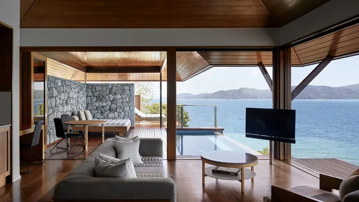 The Windward Pavilion at Qualia has a modern wooden deck and private plunge pool.