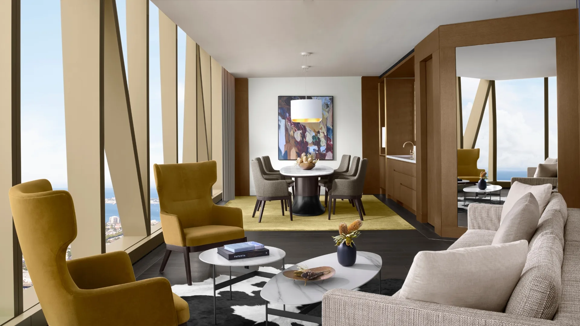 Living and dining areas in the Yarra Suite at Ritz-Carlton Melbourne hotel - the best luxury hotel in Australia