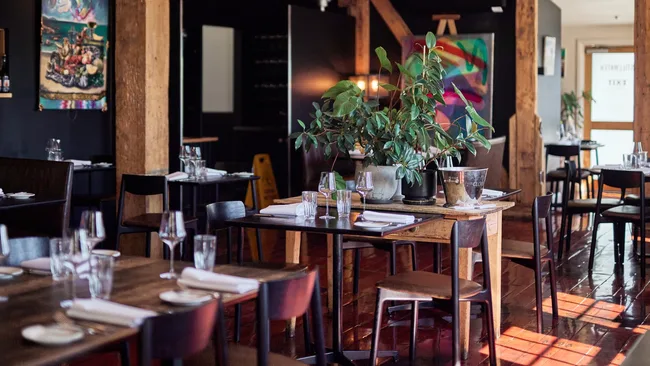Sleek, moody interiors at Stillwater Restaurant in Lanceston, Tasmania