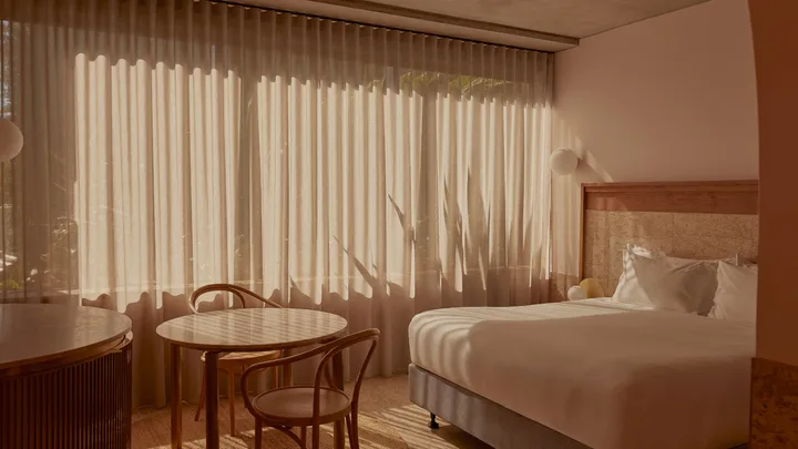 Dusky pink decor in the bedroom suite at The Calile, Brisbane.