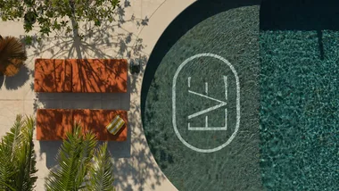 An overhead shot of the stylish rooftop pool at The Eve Hotel, Sydney